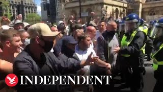 Rightwing protesters attack riot police in London [upl. by Ennairrek]