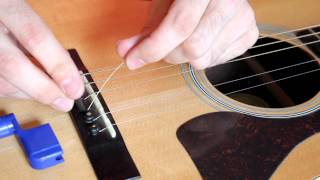 How to Change an Acoustic Guitar String EASY [upl. by Angelico]