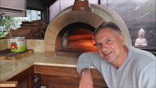 How to Use a Wood Fired Pizza Oven [upl. by Jocko]