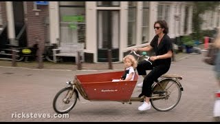 Amsterdam Netherlands Bike Culture  Rick Steves’ Europe Travel Guide  Travel Bite [upl. by Zia]