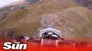 Dirt biker rides off 40ft cliff and survives Wales [upl. by Son]